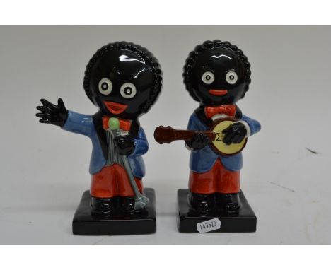 Two Carltonware golly musician figures comprising a singer 69/750 and a ukulele player 10/250, approx 19cm tall.