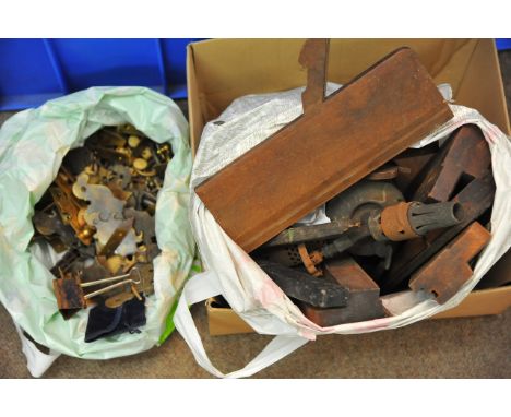 Two bags containing a collection of wood working tools and metal fittings including latches and locks