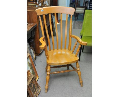 A pine open stick back chair, the solid seat on turned legs