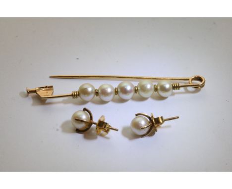 An 18ct gold pearl bar brooch and a pair of pearl ear rings.