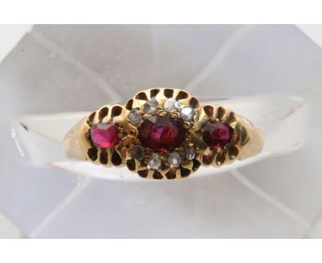 A ruby and diamond ring
