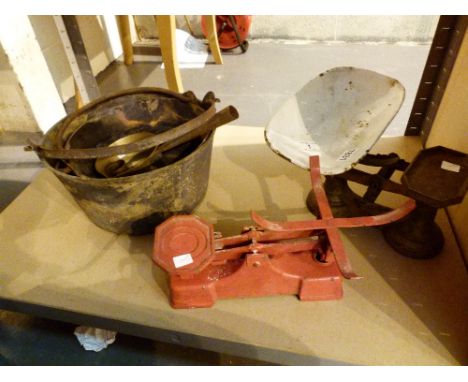 Three brass pans including jam pans and two kitchen scale bases