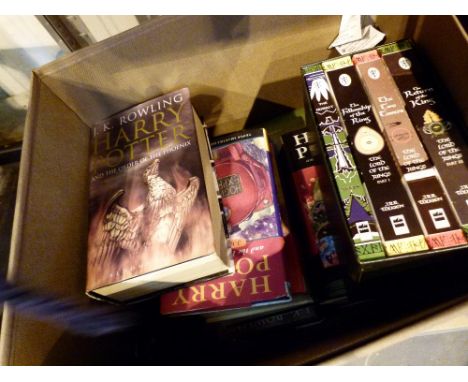 Harry Potter 1st edition books and a compendium of Lord of the Rings