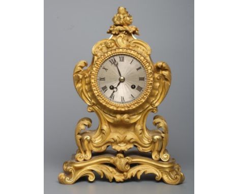 A FRENCH GILT METAL CASED MANTEL CLOCK, late 19th century, the twin barrel movement with anchor escapement and outside count 