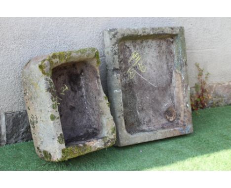 A SANDSTONE TROUGH of rough hewn oblong form, 23 1/2 x 16 1/2 x 10", together with a sandstone sink, 29" x 24 1/2" (2) (Est. 