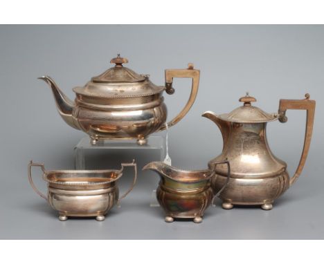 A THREE PIECE TEA SERVICE, maker Barraclough & Sons Ltd., Chester 1931, of lobed rounded oblong baluster form raised upon fou