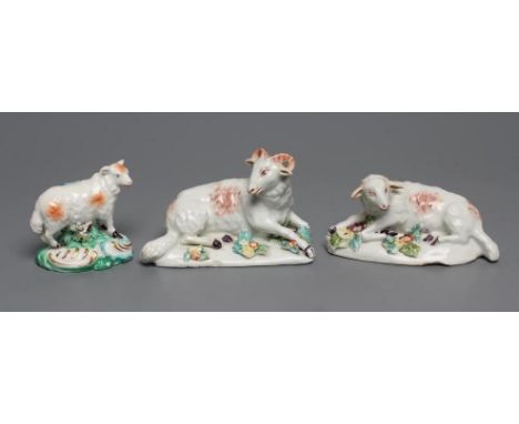 A DERBY PORCELAIN RAM AND EWE, c.1760, each modelled recumbent on a flower encrusted shaped base, patch marks, ram 4 1/4" wid