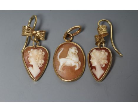 A PAIR OF SHELL CAMEO DROP EARRINGS, the heart shaped panels carved with a lady's head portrait, in a plain mount stamped 750