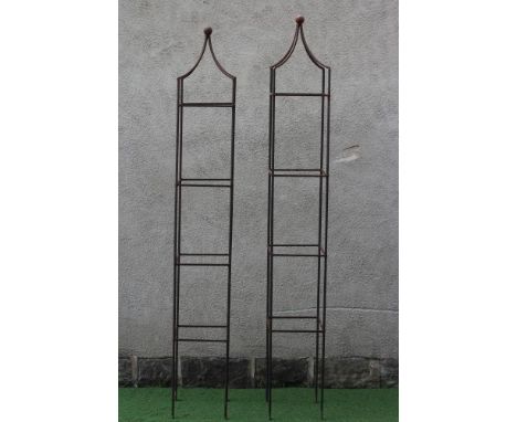 A PAIR OF WROUGHT IRON PLANT OBELISKS of square form, the pyramidal top with ball finial, rust patination, 24" x 82" (Est. pl