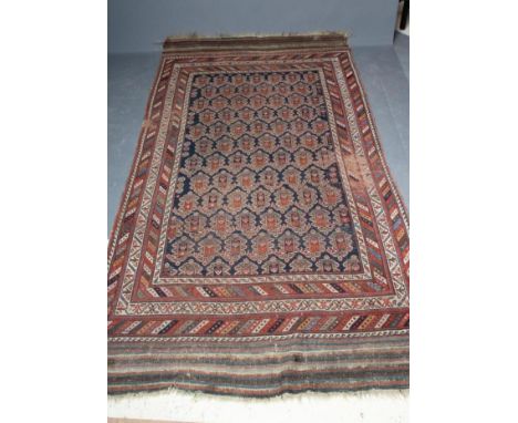 A SHRIVAN BAKU RUG, South East Caucasus, late19/20th century, the indigo blue field with repeating boteh pattern, within diag