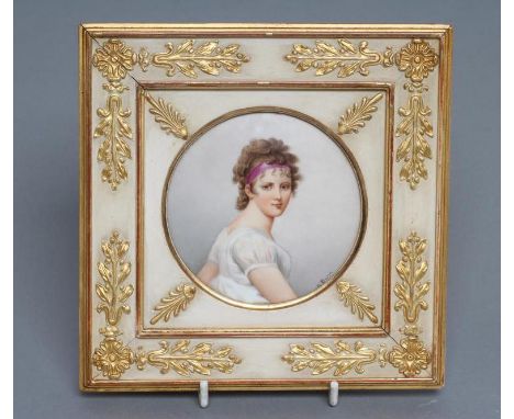 AN AUSTRIAN PORCELAIN ROUNDEL, late 19th century, painted with the bust portrait of Mme. Recamier wearing a purple band in he