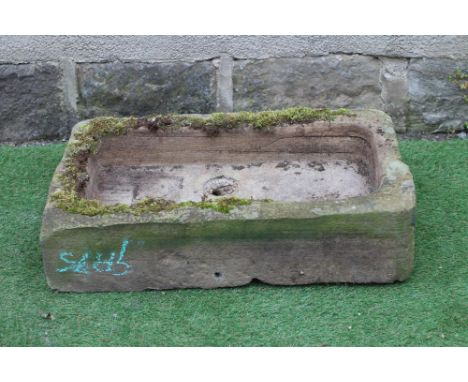 A SANDSTONE TROUGH of well cut oblong form, 30" x 16" x 6 1/2" (Est. plus 24% premium inc. VAT) Good.