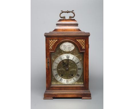A WALNUT CASED BRACKET CLOCK, early 20th century, the twin barrel movement with anchor escapement striking on a gong, 7" arch
