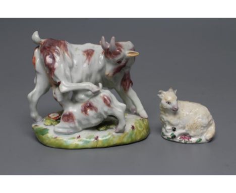 A SMALL BOW PORCELAIN SHEEP, c.1755, modelled recumbent with pale yellow fleece, on a flower painted oval base, 2" wide overa