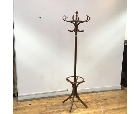 A modern bentwood coat stand, the turned shaft with reeded finial and scroll shaped hooks above a splayed base with hoop stic