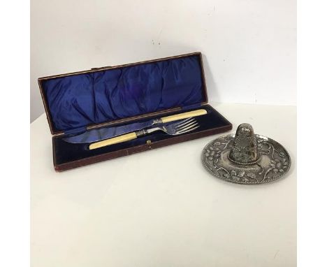 A novelty Mexican Sombrero, marked Mexico, Sterling 925 to base (7cm x d.15cm) (96.67g) and a fish server, knife and fork in 
