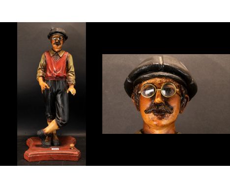 Fibreglass Figure Of A Golfer Realistically Modeled, Standing On a Plinth In 20's Clothing, With Cap And Glasses. Missing Gol