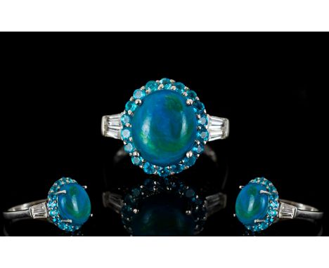 Opalina and Neon Apatite Halo Ring, a 3.75ct oval cabochon of the rare opalina, a natural mix of blue opal and chrysocolla, m