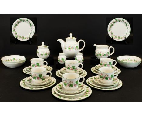 Royal Doulton 'Expressions' Tea Service in fine china to include 6 cups, 6 saucers, 6 side plates, 6 sandwich/cake plates, 5 