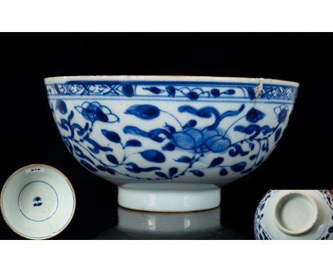 Chinese Antique Kangxi Footed Bowl Blue and white bowl with floral and foliate decoration, some nibbles to brown rim and earl
