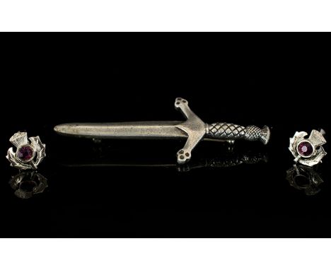 A Collection Of Celtic Themed Costume Jewellery Two items in total to include pewter kilt pin in the form of a dagger with th