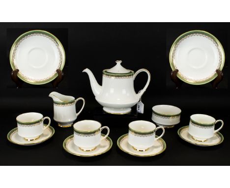 'Paragon' Bone China Tea Service made in Stoke on Trent, to include; Tea pot, milk jug, sugar bowl, and four tea cups and sau