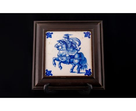 18th Century Dutch Tile Depicting a man on horseback in wood frame, backed with a rare Christopher Dresser fabric 9 x 9 inche