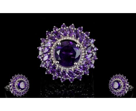 Amethyst 'Sunflower' Statement Ring, a central, round cut amethyst of 3ct, set above a milgrain frame, encircled by a band of