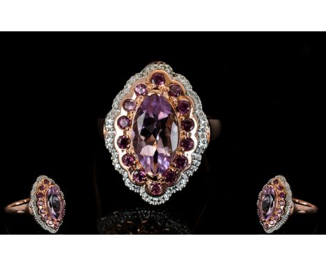 Rose de France Amethyst and Rhodolite Garnet Marquise Shape Ring, the Rose de France amethyst being a 2.5ct marquise cut, fra