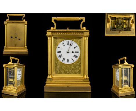 French 19thC Petite Sonnerie Gilt Metal Repeating Carriage Clock of large proportions, in the English Style. The architectura