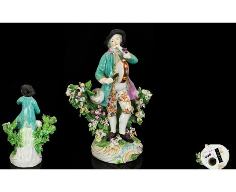 Chelsea Derby Hand Painted Porcelain Figure - Painted In Polychrome Enamels, Depicts a Young Male Musician of Colourful Dress