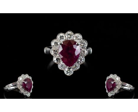 Ladies Superb Quality 18ct White Gold Ruby &amp; Diamond Set Cluster Ring of Pear Shape.  The pear-shaped faceted ruby of exc