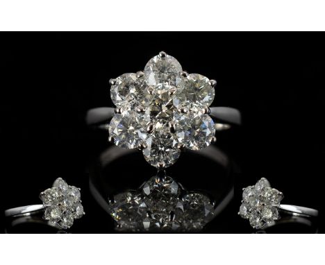 18ct White Gold 7 Stone Diamond Set Cluster Ring Superb quality ladies ring, flower head design.  The colour and clarity of d