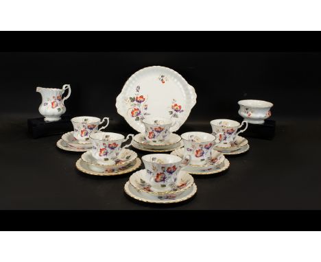 Royal Albert Dinner Service Bone China 21 piece service, white ground with gilt trim and lilac, red and pale green floral pat