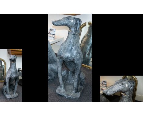 A Large Resin Figure In The Form Of A Greyhound floor standing figure of seated greyhound finished in textural grey tones to 