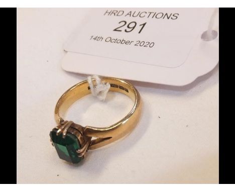 A green stone lady's dress ring in 22ct gold setting CONDITION REPORTWe have attached a number of additional images to showca