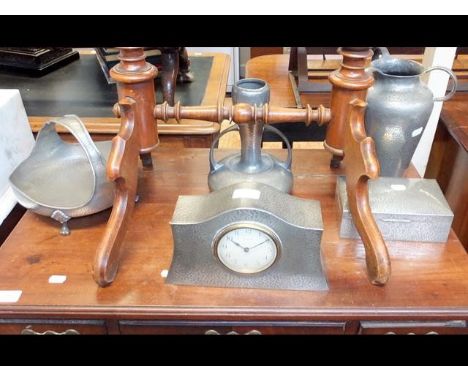 An English pewter mantel clock, together with other pewter 