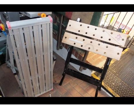 A folding decorator's ladder, together with workbench 