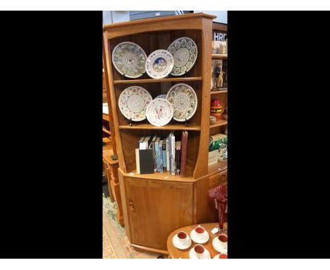 An Ercol Golden Dawn corner cabinet with open shelves to top - height 180cms