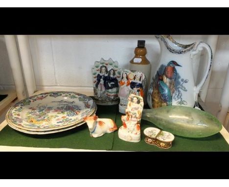 A vintage Skinner bottle, various Staffordshire figures, two iron stone plates etc