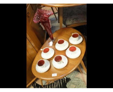 Six Susie Cooper coffee cups and saucers together with a cranberry glass vase with crimped edge