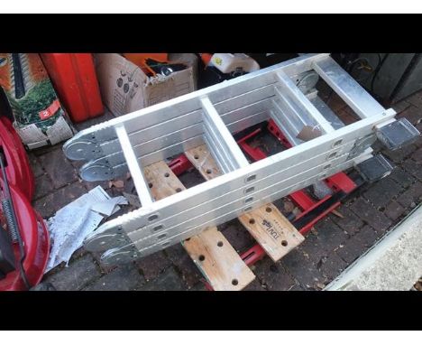 A folding workmate, together with a Master Step folding ladder 