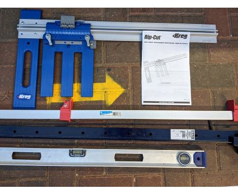A Kreg rip-cut tool, two sash clamps and a level