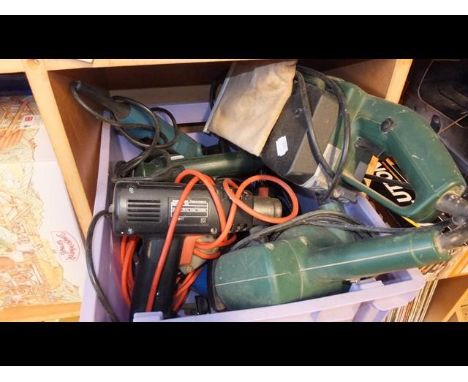 A plastic box containing various electrical tools 