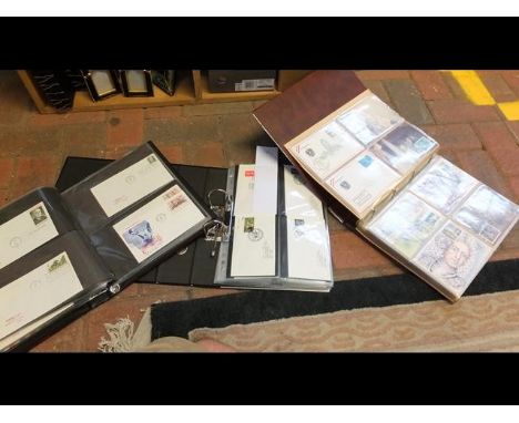 Six folders containing assorted postal ephemera, including First Day covers
