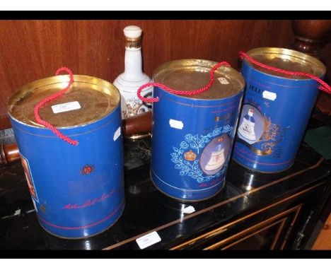 An unopened Bell's Scotch Whisky decanter, together with three others 