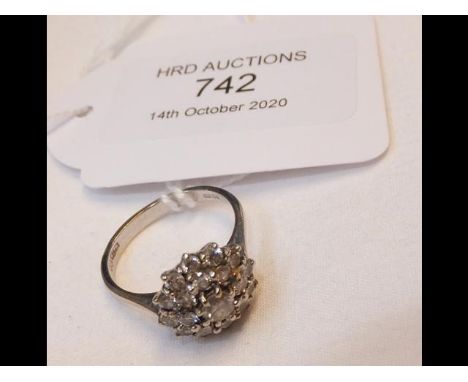 An 18ct white gold diamond cluster ringCONDITION REPORTWe have attached a number of additional images to showcase the lot in 