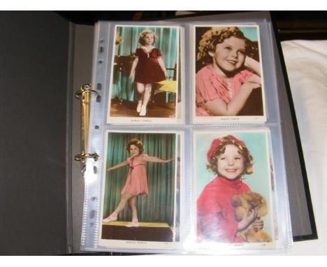 An album of vintage photographs of Shirley Temple - approx. 28 postcards 