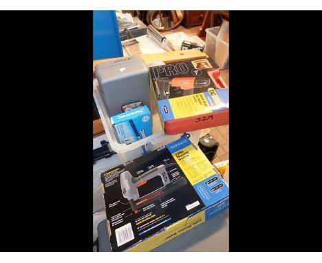 A boxed Rapesco 230v Master Nailer, together with other boxed tools  