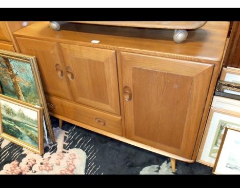 An Ercol Golden Dawn sideboard with three cupboards and single drawer under - width 115cmsCONDITION REPORTBy our judgement, c